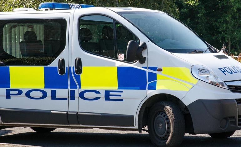 Cyclist injured following collision with police van