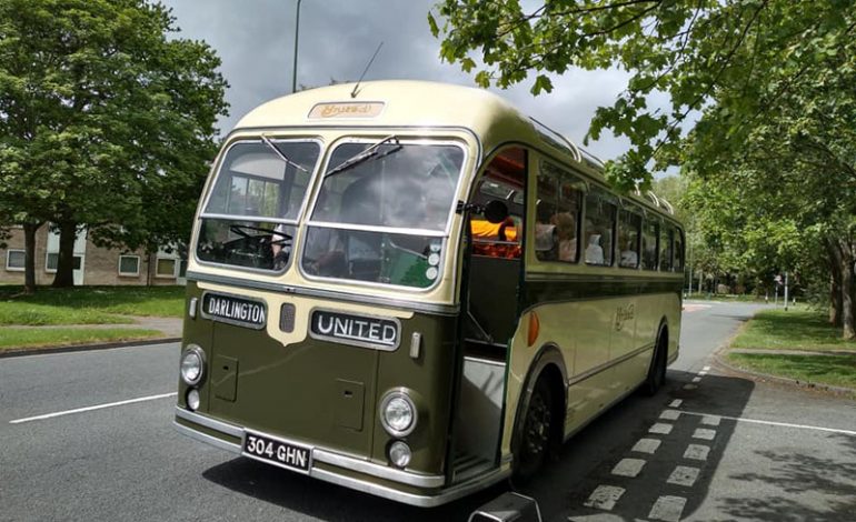 Community Association members enjoy trip out on classic bus