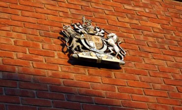 WOMAN CHARGED WITH £600K FRAUD