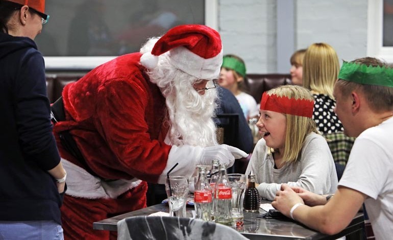 Santa lights up faces with an early visit at ROF 59