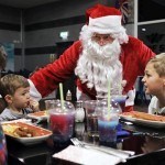 Santa hands out presents at Rof 59 in Newton Aycliffe. Picture by Stuart Boulton.