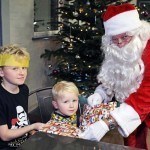 Santa with brothers 4-year-old Alfie and 8-year-old Archie Brown at Rof 59 in Newton Aycliffe. Picture by Stuart Boulton.