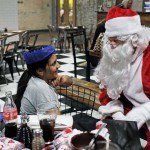 Santa with 9-year-old Evie Viswa Nathan at Rof 59 in Newton Aycliffe. Picture by Stuart Boulton.