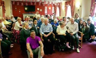 Students celebrate Queen’s birthday with elderly