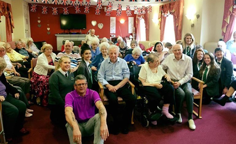 Students celebrate Queen’s birthday with elderly