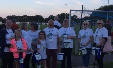 Footie Fans Dig Deep for Charity