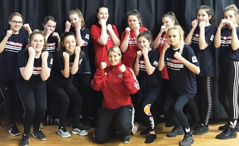 Girls team up with British boxing champion