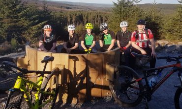 Students get on their bikes during after-school Hamsterley trips