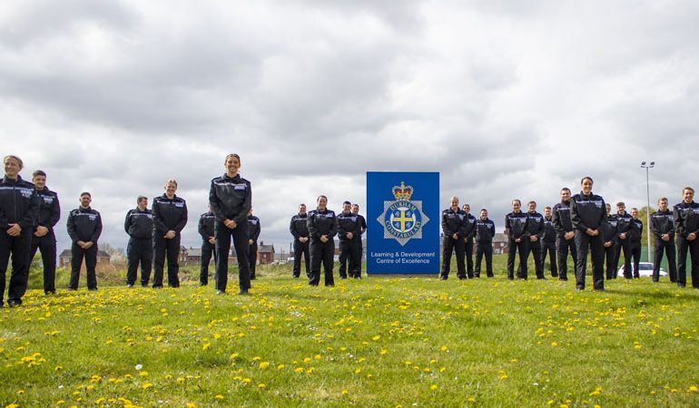 New police recruits start training – but keep their distance