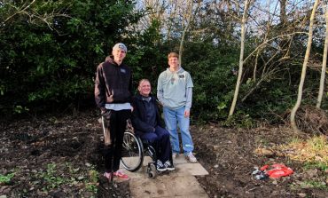 Missionaries ‘shovel’ support to shape woodland garden
