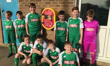 Defibrillator installed at Greenfield thanks to student’s fundraising